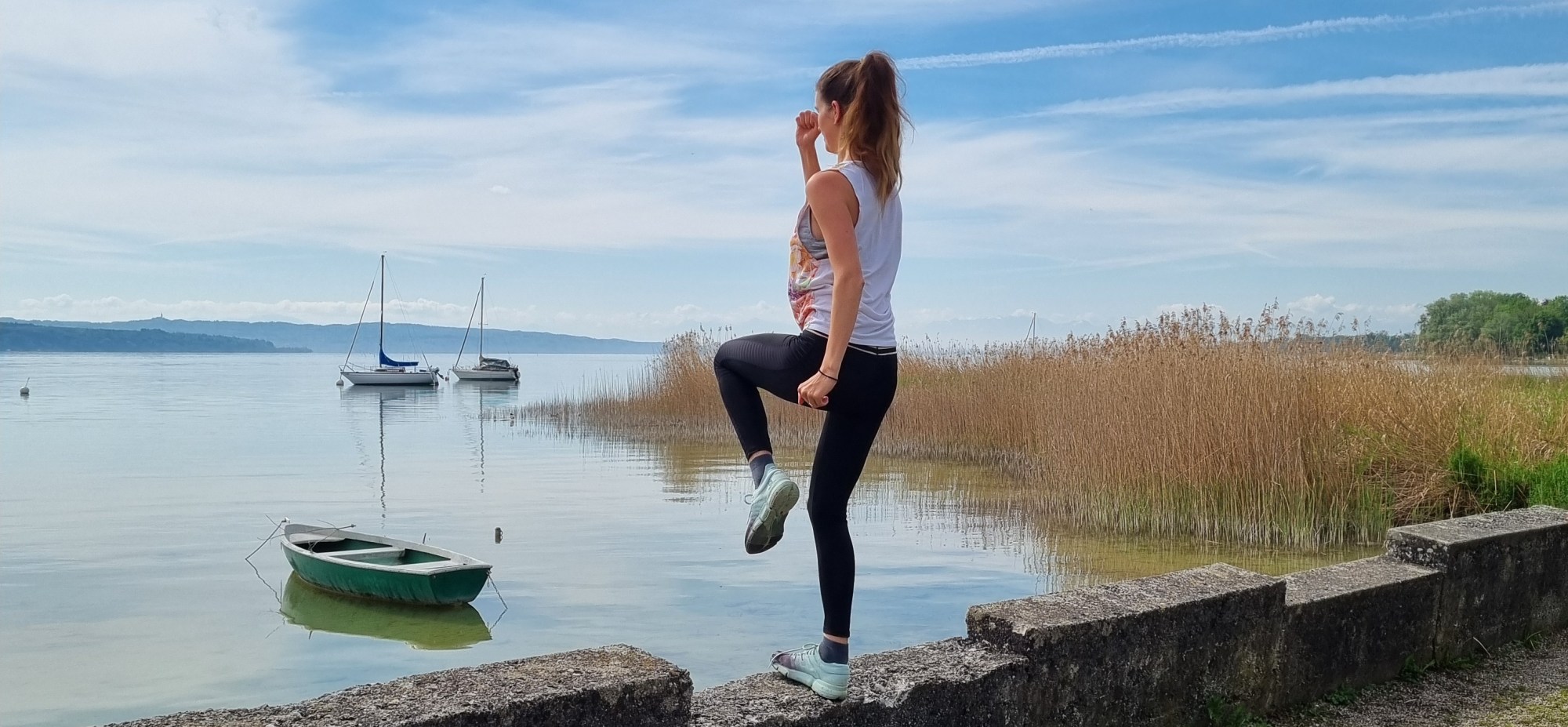 Frau Trainiert am Dampfersteg in Schondorf